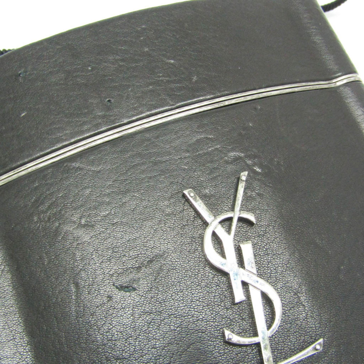 Yves Saint Laurent Opium · Leather