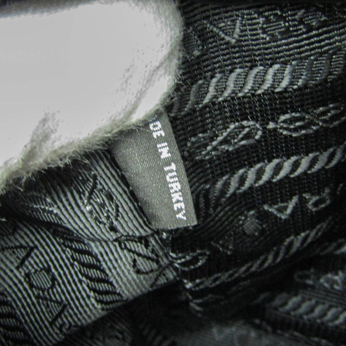 Prada Logo Jacquard · Leather
