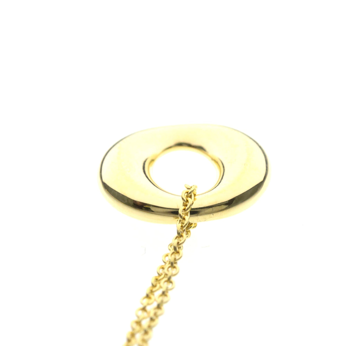 Tiffany Sebiana · 18K Yellow Gold