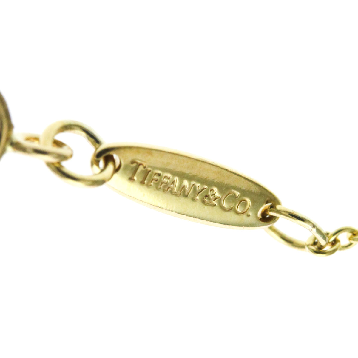 Tiffany Sebiana · 18K Yellow Gold