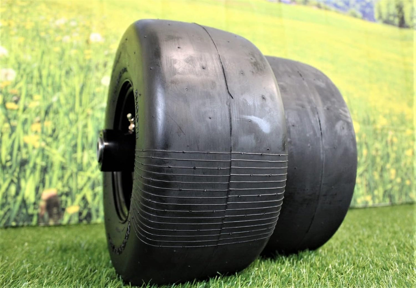 13x6.50-6 Semi-Pneumatic Flat Free Smooth with 6x4.5 Black Wheel (Set of Four)
