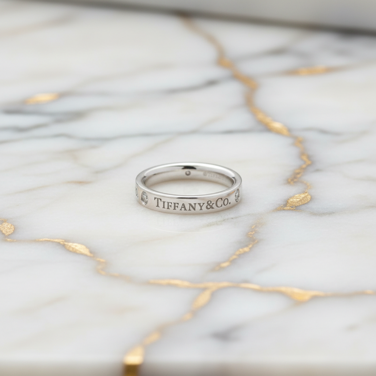 Tiffany Three Diamond · Platinum