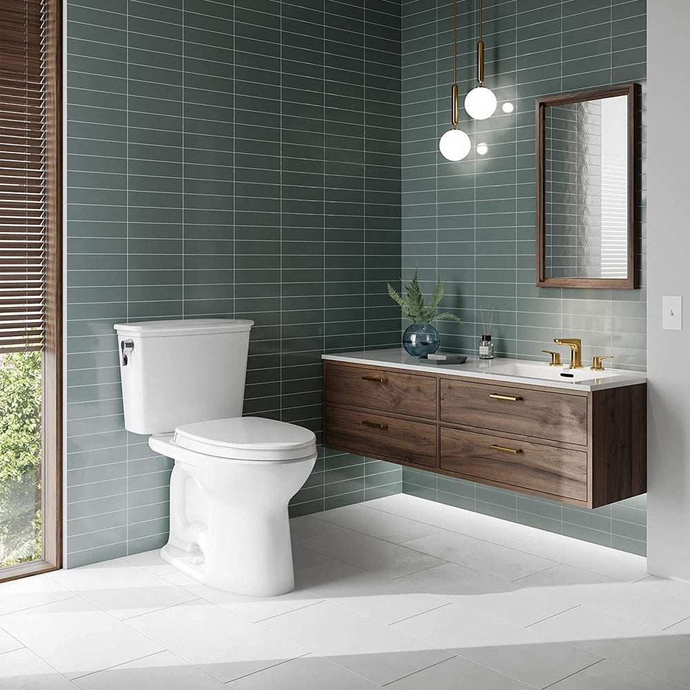 TOTO Drake Two-Piece Elongated 1.28 GPF Universal Height Toilet, Cotton White