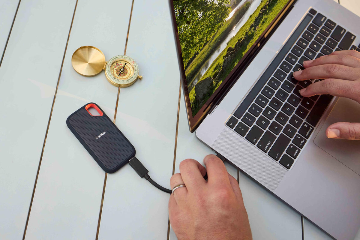 SANDISK 2TB Extreme Portable SSD (Old Model) - Up to 1050MB/s, USB-C, USB 3.2 Gen 2, IP65 Water and Dust Resistance, Updated Firmware - External Solid State Drive - SDSSDE61-2T00-G25